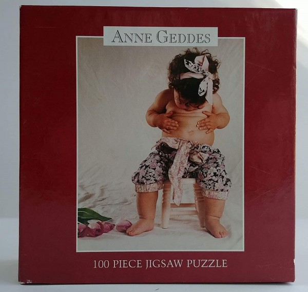 Anne Geddes 100 Piece Jigsaw Puzzle Little Girl Looking at Her Belly Button 9x 7