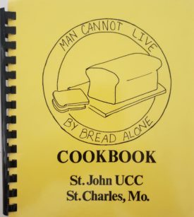 Man Cannot Live By Bread Alone Cookbook (Plastic-comb Paperback)